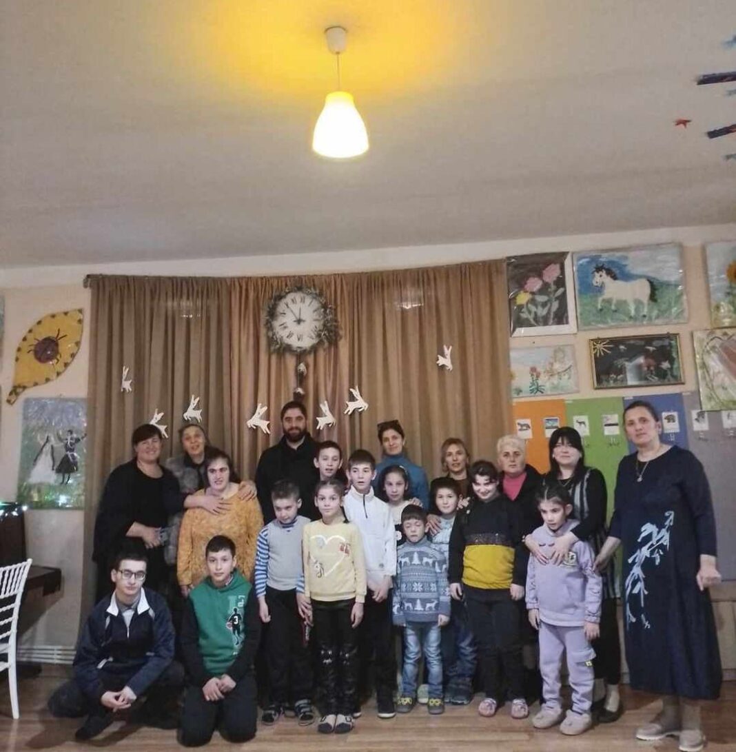 Father Shalva of Melauri St. Peter and Paul Church visits the Children's centre credit: facebook